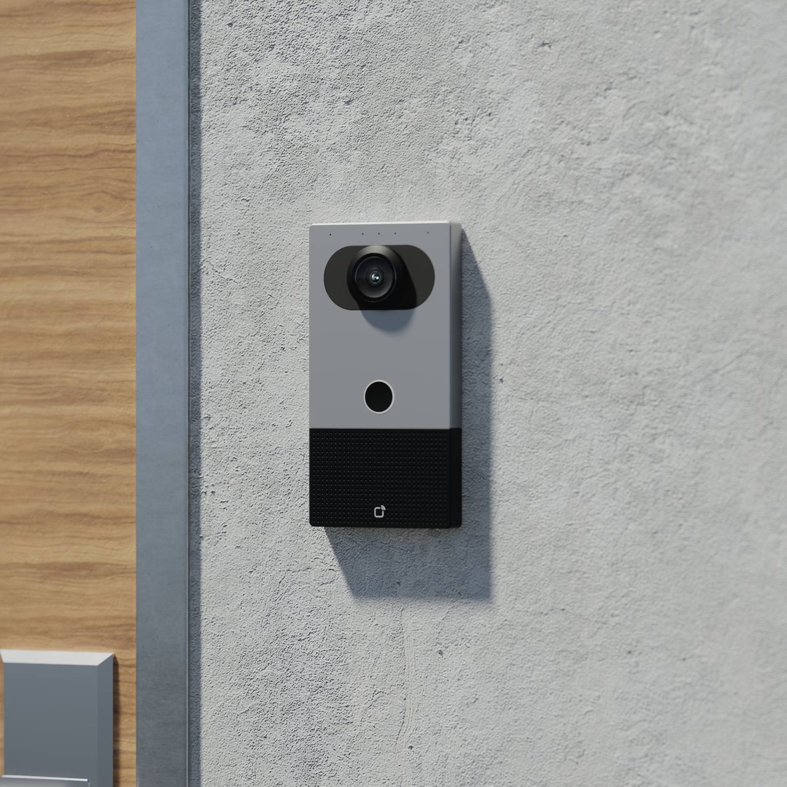 Verkada video intercom mounted on a concrete office wall